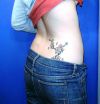 cherry blossom lower back tattoo